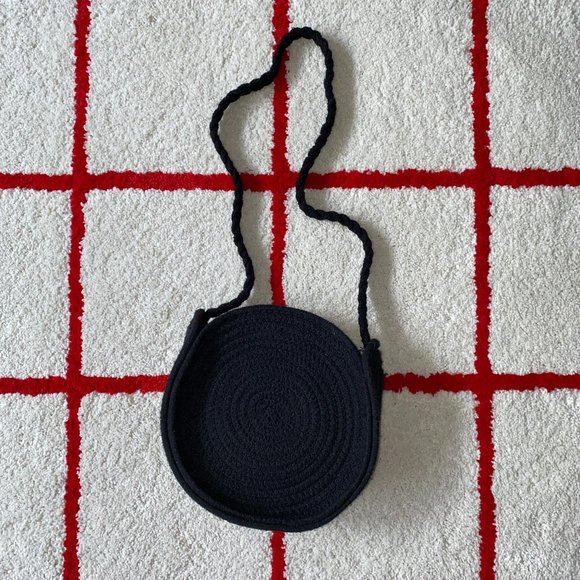 Urban Outfitters Handbags - Urban Outfitters Woven Circle Crossbody Black Bag